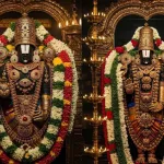 Venkateshwara Swami idol in Tirumala temple adorned with flowers and gold ornaments