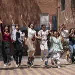 Students celebrating CBSE Class 12 results in Vijayawada, topping with 99.60% pass rate in 2025