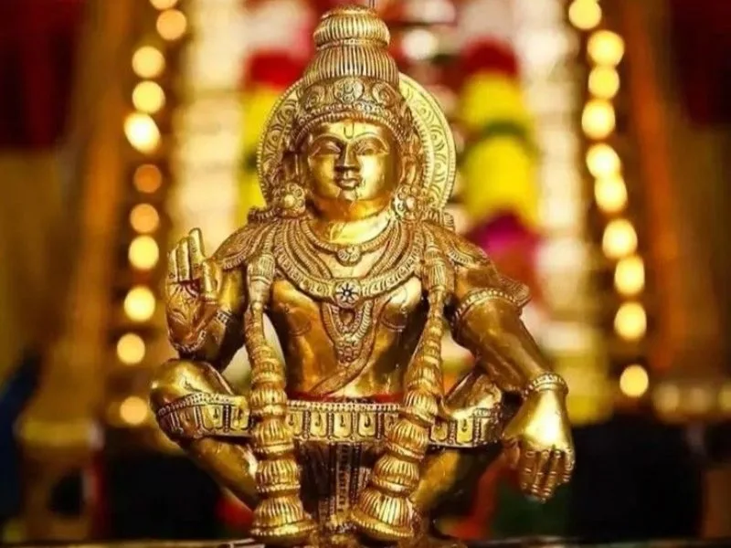 Devotees chanting Ayyappa bhajans during Punguni Uthiram, marking Ayyappa Jayanti 2025 at Sabarimala.
