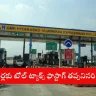Two-wheeler with FASTag at a toll plaza on a national highway in India in 2025