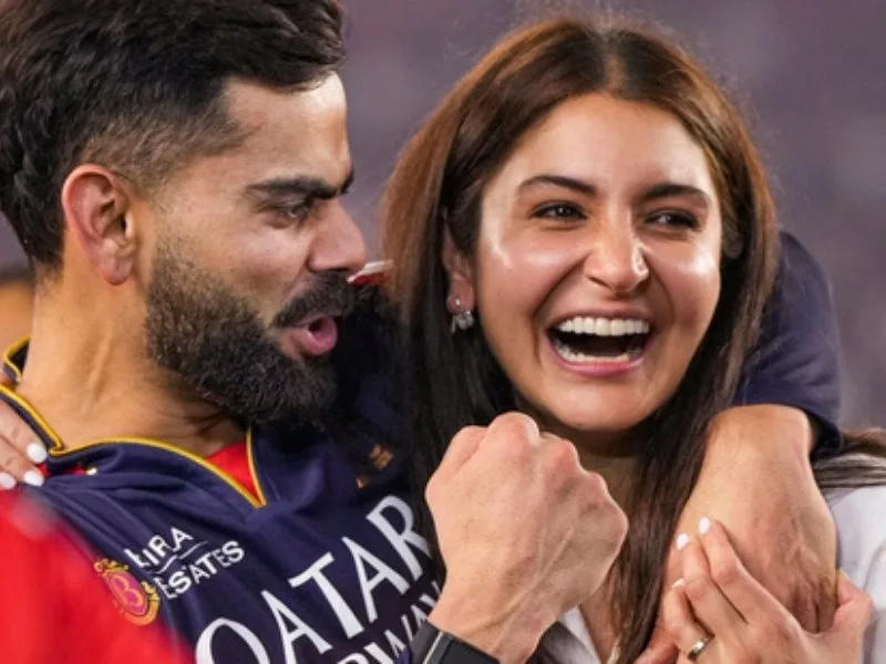 Virat Celebrating his trophy dream with wife Anushka Sharma