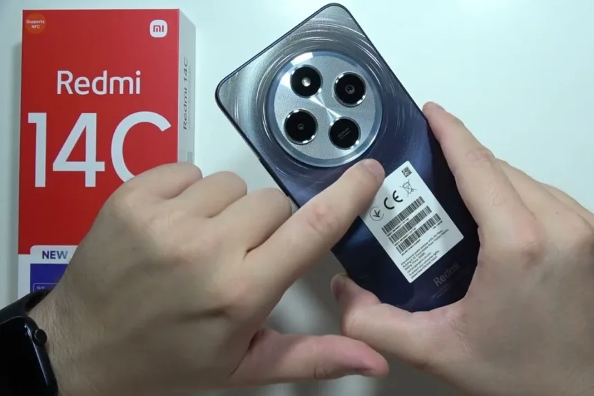 Xiaomi Redmi 14C 5G smartphone showcasing its premium design in a tech store in 2025
