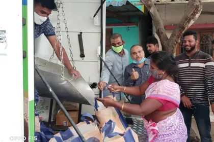 Ration dealer delivering supplies to a senior citizen’s home in Andhra Pradesh under the 2025 door delivery scheme starting June 26.