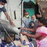 Ration dealer delivering supplies to a senior citizen’s home in Andhra Pradesh under the 2025 door delivery scheme starting June 26.