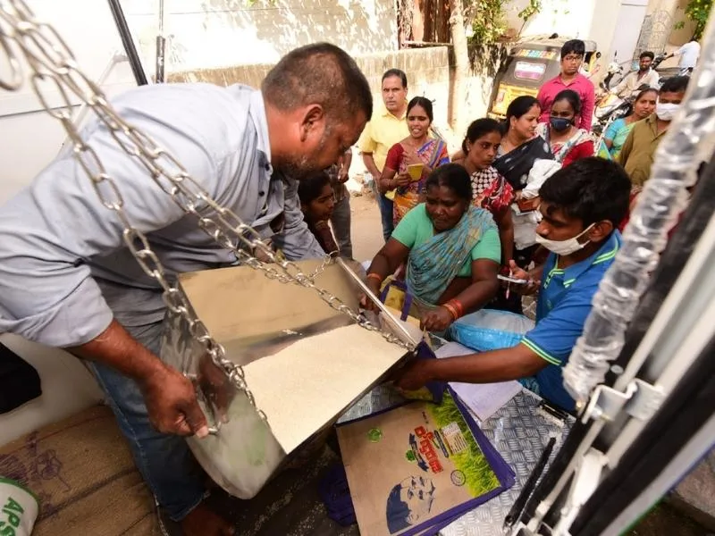 Ration supplies including rice and sugar being prepared for door delivery to differently-abled persons in Andhra Pradesh, July 2025.