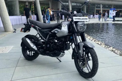 Bajaj Freedom 125 CNG in Garnet Red, now priced at Rs 85,976 with a Rs 5,000 discount in 2025, offering 330 km mileage.