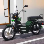 Bheem electric scooter 2025 parked on a rural road in Andhra Pradesh