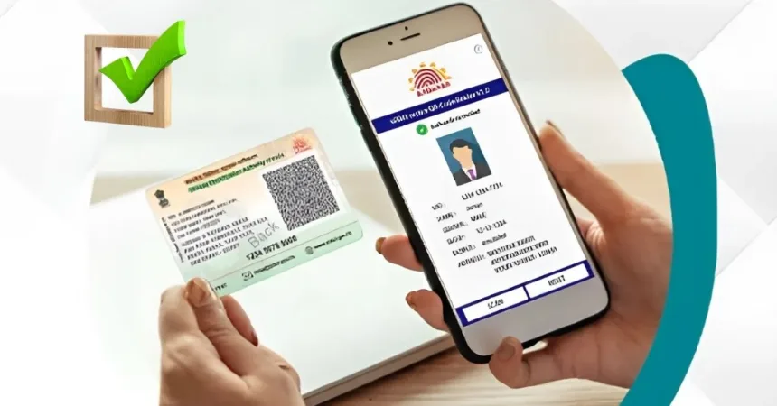 user scanning e-Aadhaar QR code for verification, India 2025