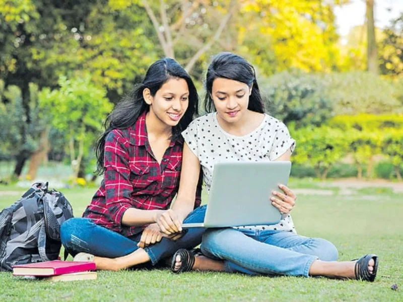 Students checking AP EAPCET 2025 rank cards online, results released on June 8, 2025.