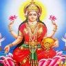 Goddess Lakshmi emerging from Samudra Manthan on a lotus, symbolizing her divine birth in Hindu mythology, relevant for 2025.