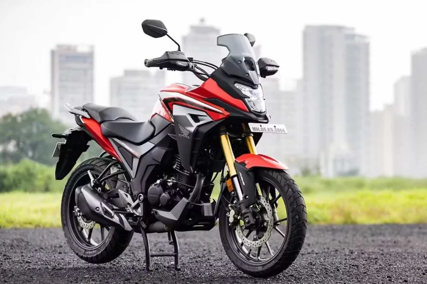Honda CB200X 2025 in Sports Red, showcasing rugged adventure design with 184cc engine for Indian riders