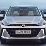 Hyundai Aura 2025 in Fiery Red, showcasing stylish compact sedan design with 20 kmpl mileage for Indian families