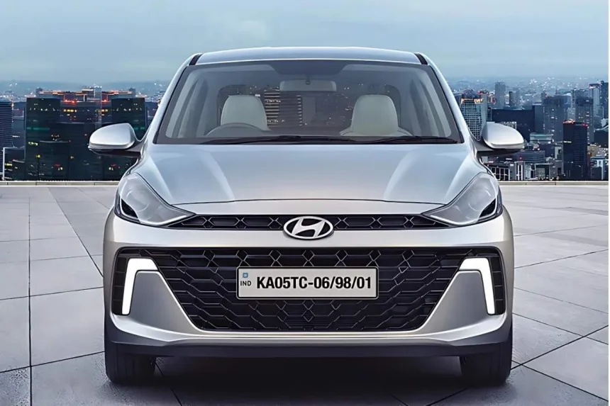 Hyundai Aura 2025 in Fiery Red, showcasing stylish compact sedan design with 20 kmpl mileage for Indian families