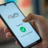 India Post counter with a dynamic QR code for UPI payments, set to be implemented across all post offices by August 2025.