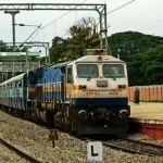 Indian Railways train at a station, reflecting the fare hike effective from July 1, 2025, with ticket price increases.
