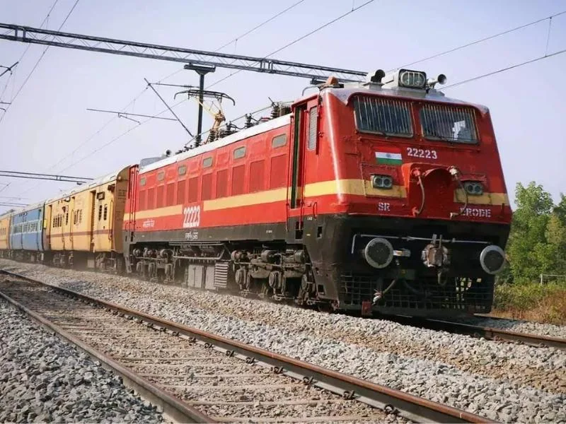 Indian Railways ticket counter displaying new waiting ticket rules for 2025