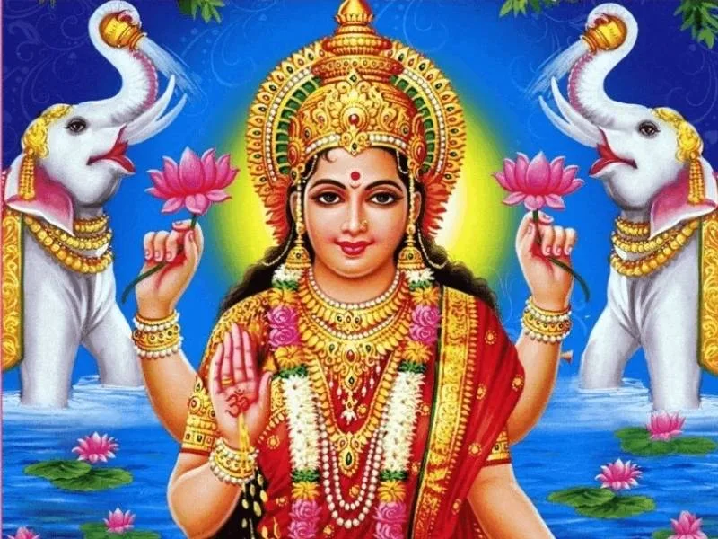 Depiction of Goddess Lakshmi with lotus and gold coins, representing her birth story and puja significance in 2025