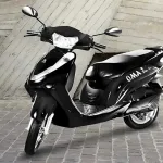 Lohia Oma Star electric scooter 2025 in Red, showcasing simple design with 65 km claimed range for Indian commuters
