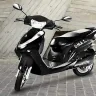 Lohia Oma Star electric scooter 2025 in Red, showcasing simple design with 65 km claimed range for Indian commuters