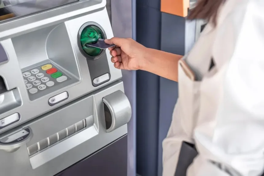 Customer using ATM under new banking charges for July 2025 in India