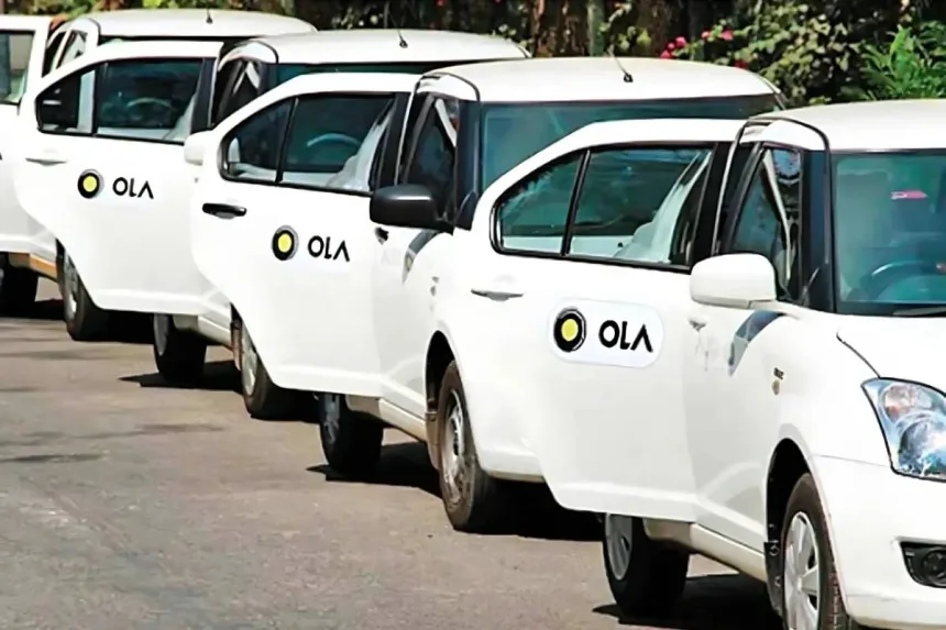 Ola driver using app under zero commission model, retaining 100% fare earnings nationwide in 2025.