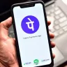 PhonePe logo with feature phone showcasing UPI payments launch in India for 2025.