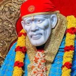 Shirdi Sai Baba idol at Shirdi temple, symbolizing his spiritual legacy of Shraddha and Saburi, revered in 2025.
