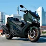 2025 Suzuki Burgman 400 in Bright Metallic Blue with gold wheels on Andhra Pradesh street