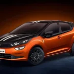 Tata Altroz Racer 2025 in Atomic Orange, showcasing sporty hatchback design with race-inspired styling for Indian car enthusiasts