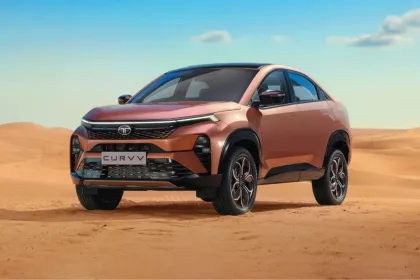 Tata Curvv 2025 in Cosmic Gold, showcasing coupe SUV design with updated pricing for Indian buyers