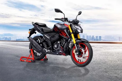 2025 TVS Apache RTR 200 4V in Glossy Black, showcasing sporty design with 37mm USD forks for Indian riders