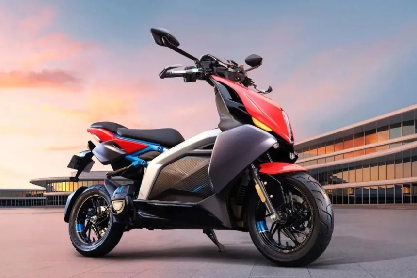 TVS X electric scooter 2025 in Red, showcasing sporty design with 150 km IDC range for Indian riders