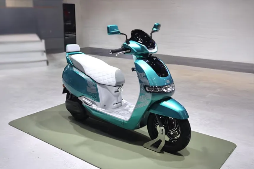 TVS iQube ST electric scooter 2025 in starlight blue beige on Andhra Pradesh street