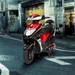 Ujaas eGo electric scooter 2025 in red color on Andhra Pradesh street