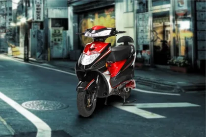 Ujaas eGo electric scooter 2025 in red color on Andhra Pradesh street