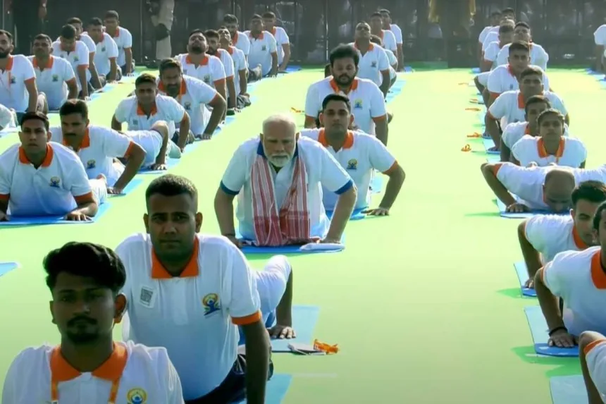 Yogandhra 2025 event at RK Beach, Vizag, with 1 lakh participants practicing yoga on International Yoga Day, June 21, 2025.